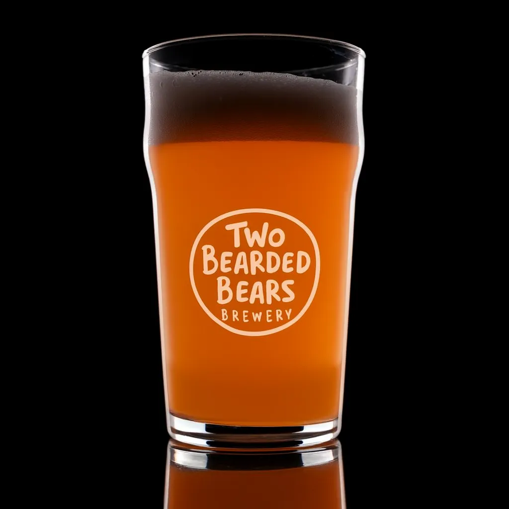 20 oz. English Pub Glass — custom engraved with a brand logo