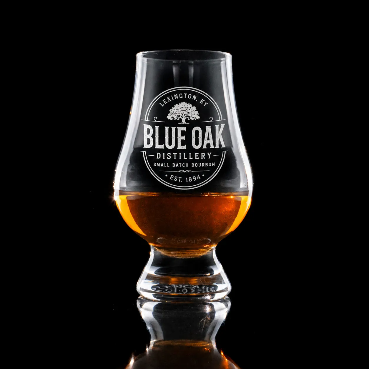 Glencairn Whiskey Glass — custom engraved with a brand logo