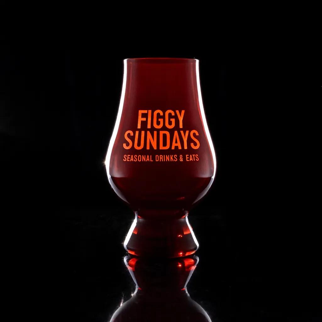 Red Glencairn Glass — custom engraved with a brand logo